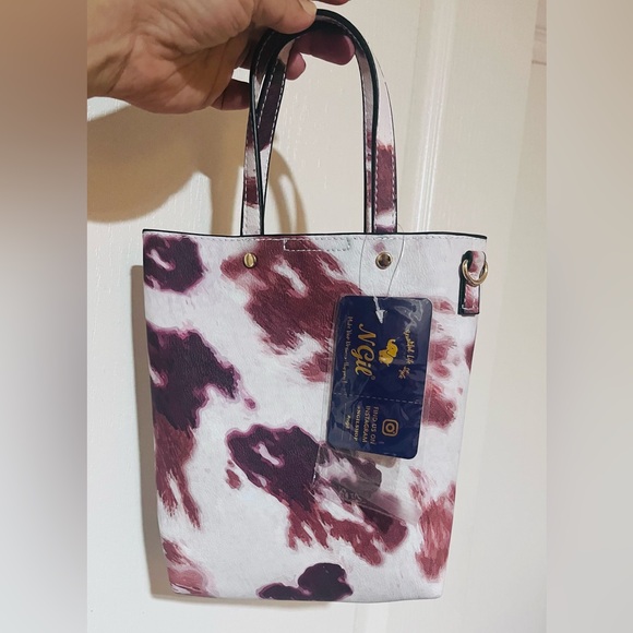 Adorable Cow Print Tote with colorful strap. - Picture 2 of 2